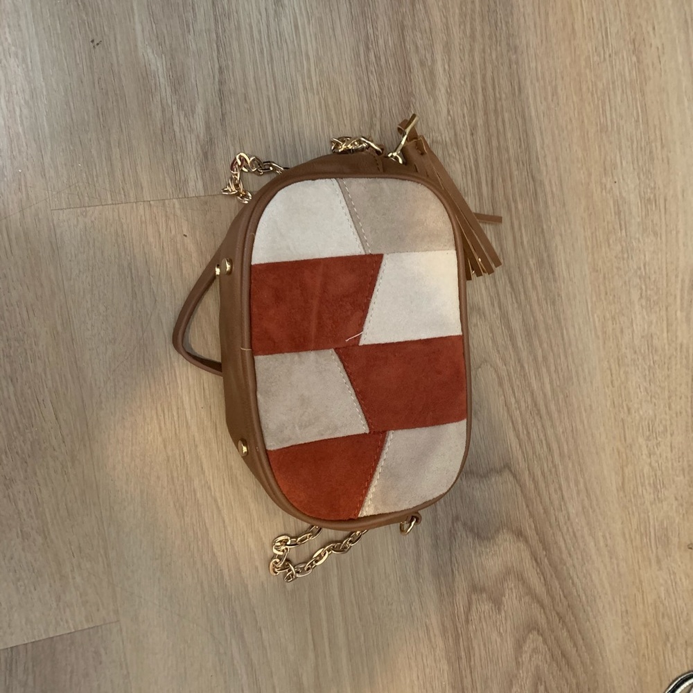 A small white and tan going out tote!